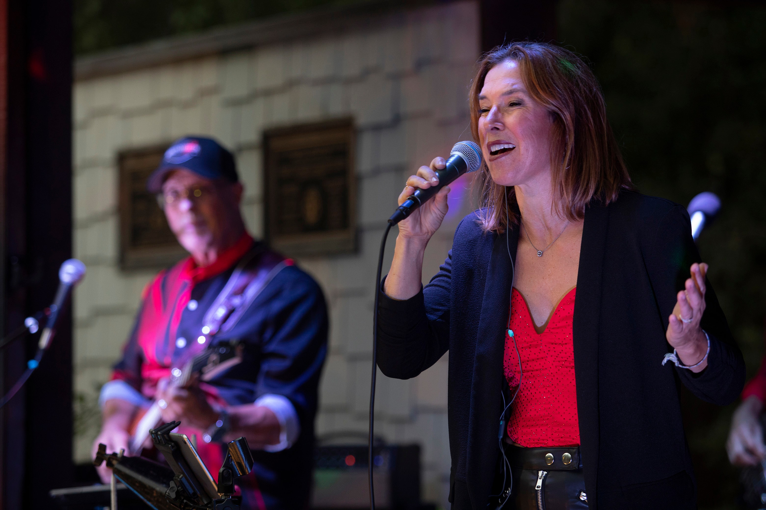 SideKarz vocalist performing on stage